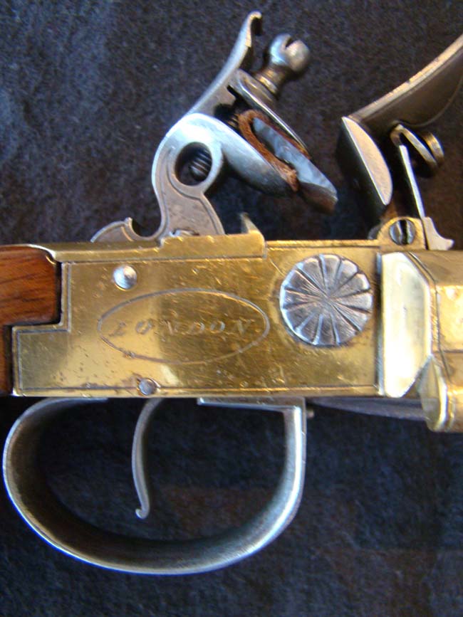 A RARE English Brass Double Cannon Barrel Flintlock Pistol with spring bayonet by Dawes, London, circa 1790. — image 7